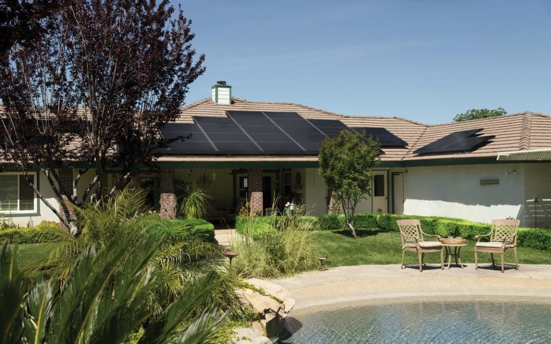 A landscaped outdoor living space with a pool