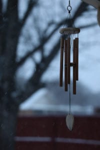 A windchime on a snowy night