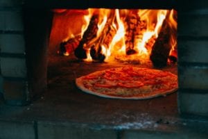 Oven fired pizza in Pizza oven