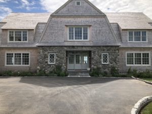 Maine coastal home with stone veneers