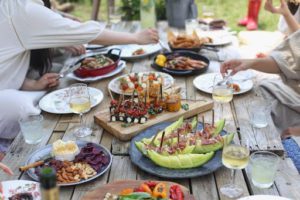 people enjoying food outdoors