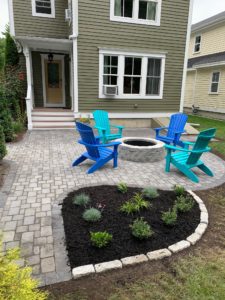 Stone patio with blue patio furniture