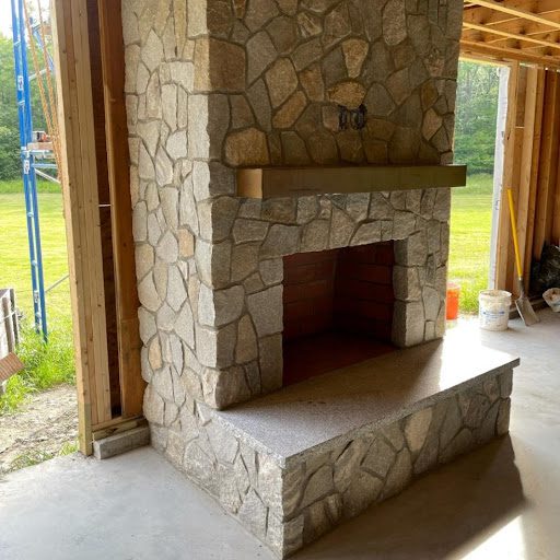 fireplace installation by Stone Solutions Maine