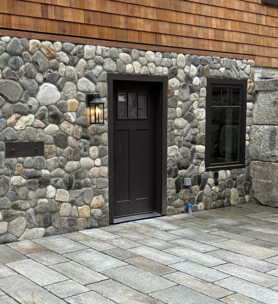 Stone veneer exterior of Maine home