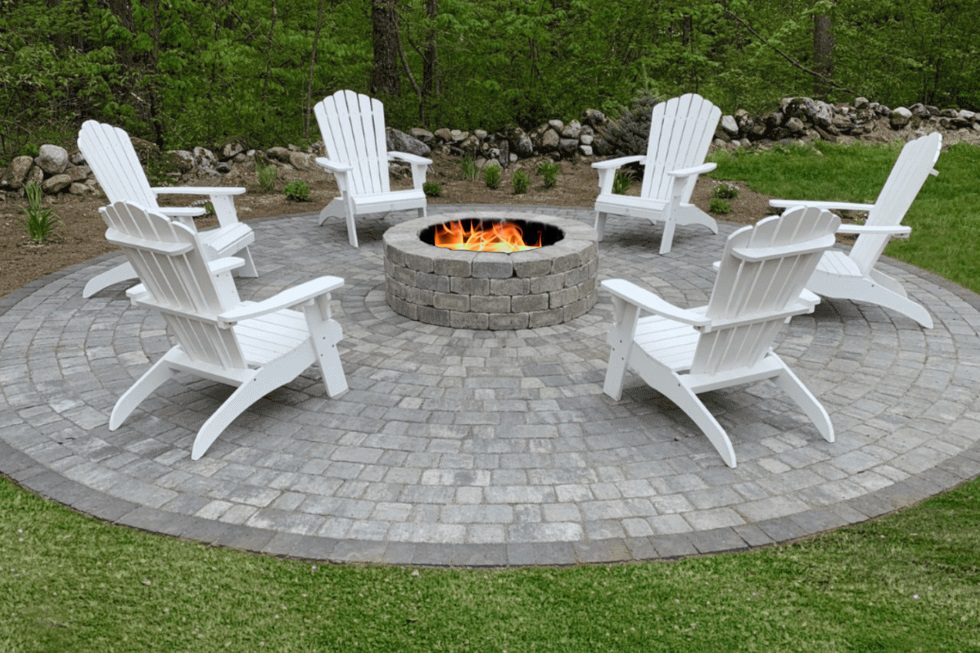 stone fireplace with chair seating