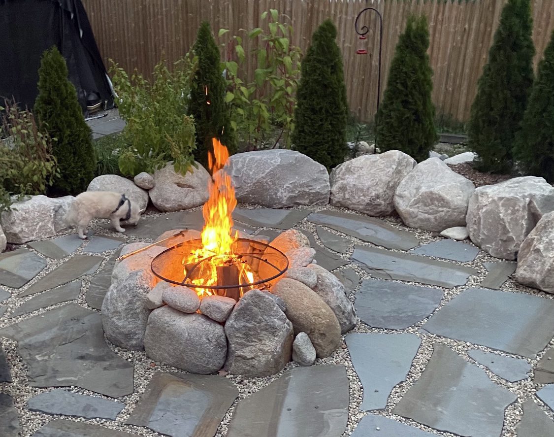 natural stone boulder fire pit