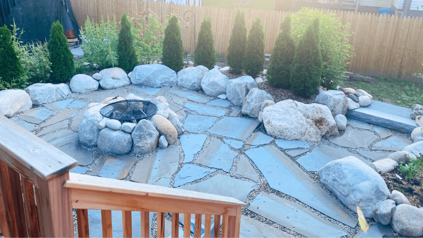 boulder fire pit flagstone patio