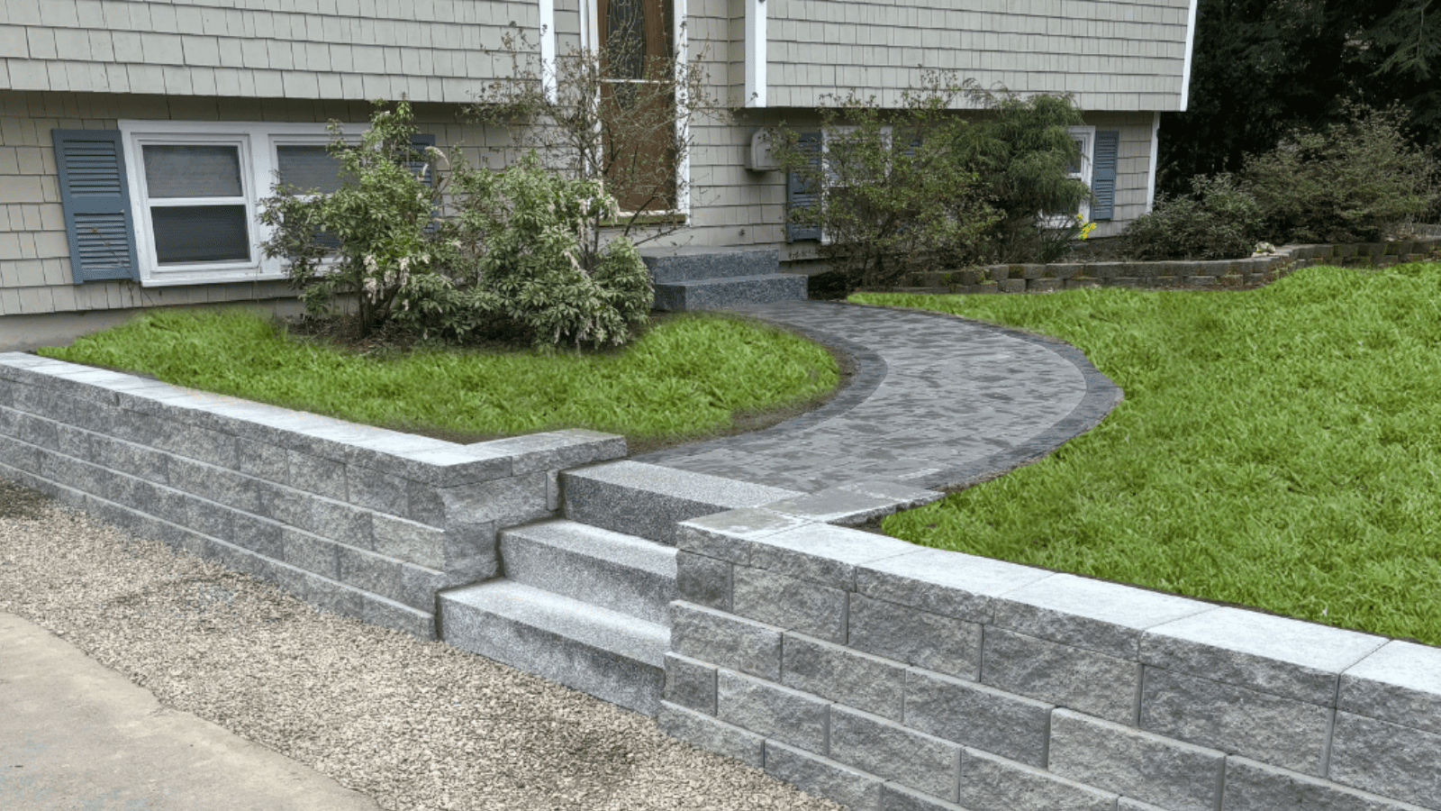 Granite steps and paver walkway with retaining wall 