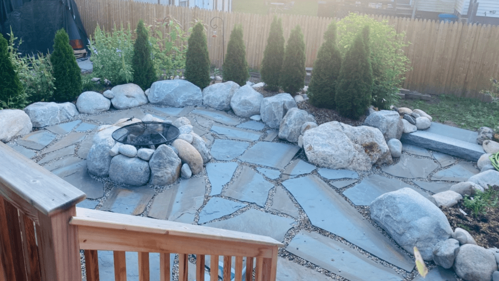 Natural stone fire pit patio