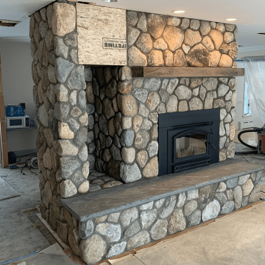 Natural stone veneer fireplace