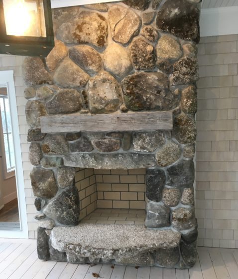 Stone veneer fireplace