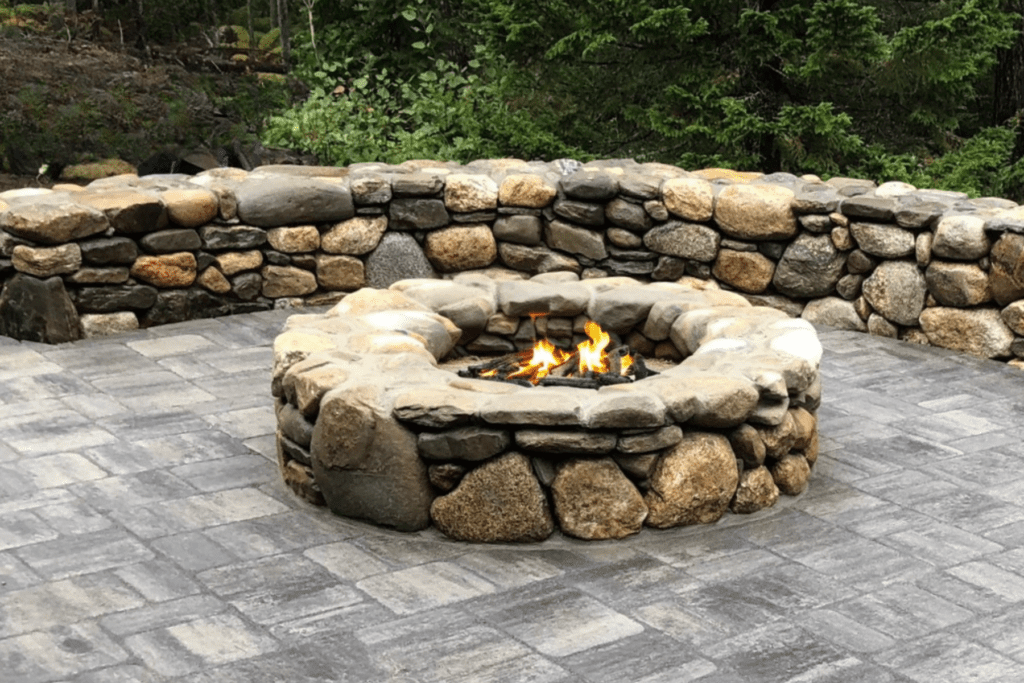 Stone fire pit patio with built in seating