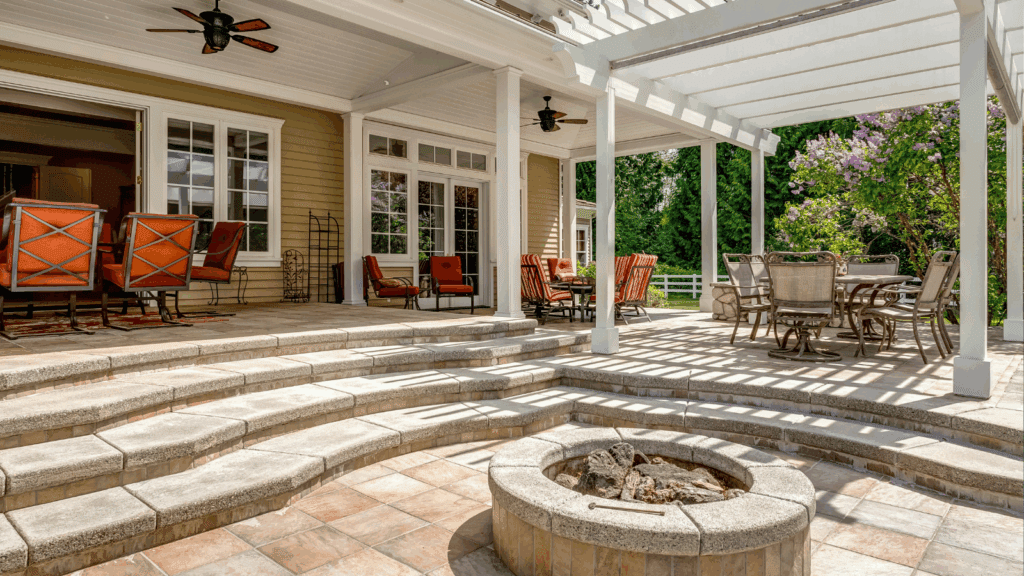 White pergola natural stone patio fire pit