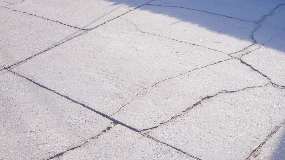 cracked-concrete-driveway-replacement-needed