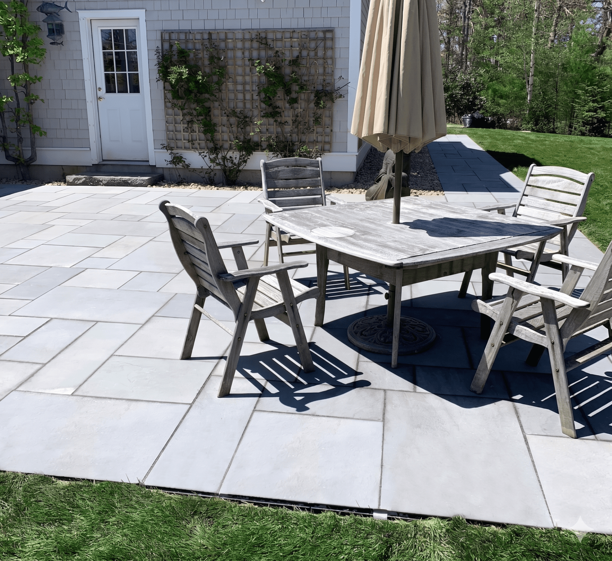 bluestone-paver-patio-outdoor-dining-coastal-maine-home