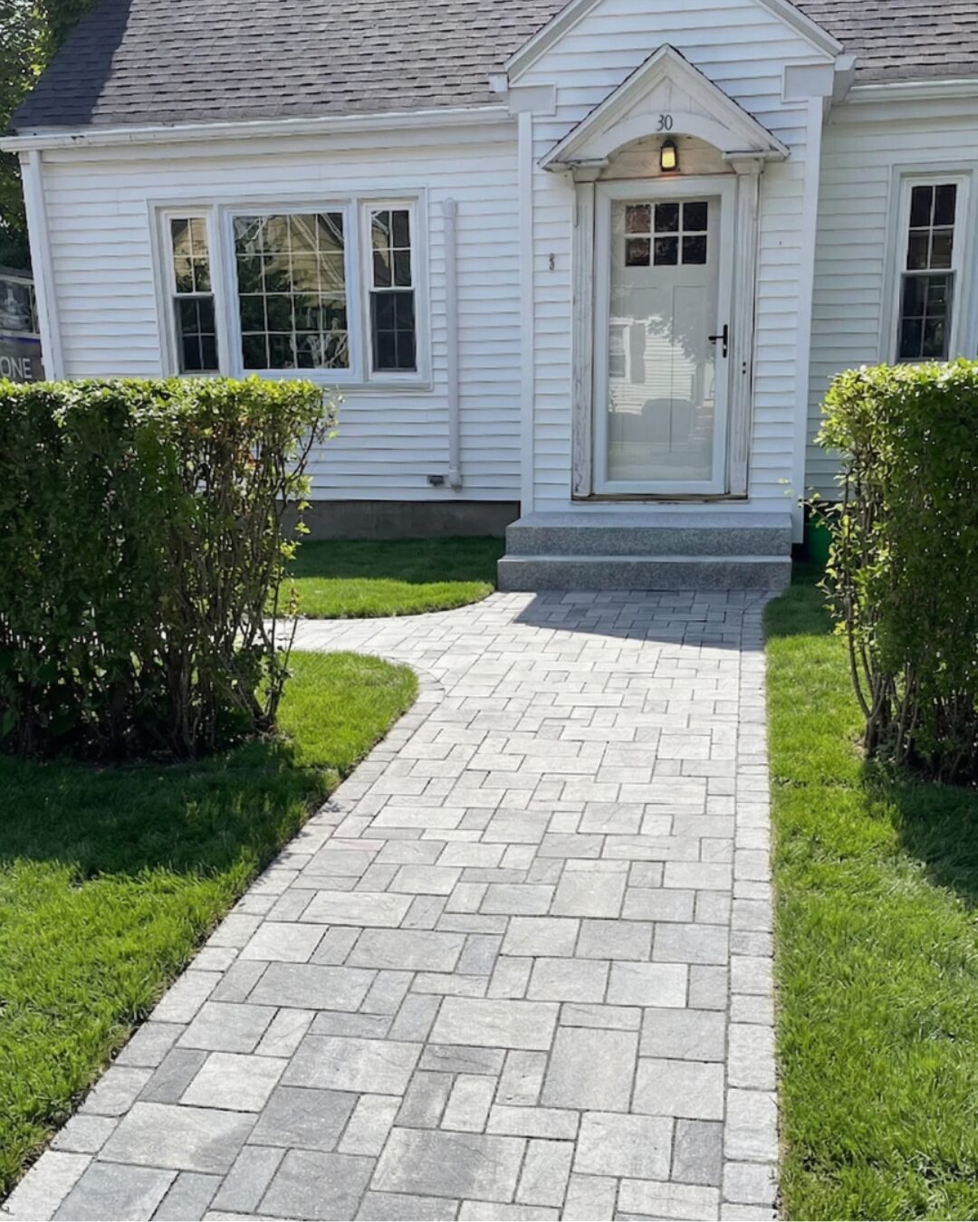 classic-front-entrance-paver-walkway-granite-steps