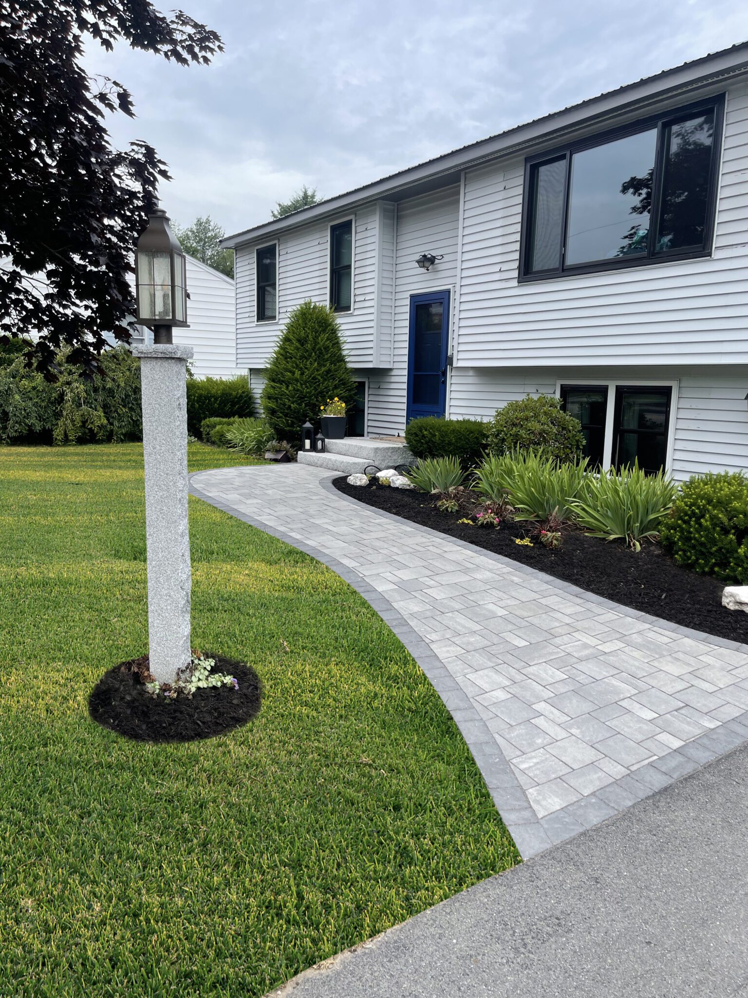 curved-paver-walkway-granite-post-light-blue-door-maine