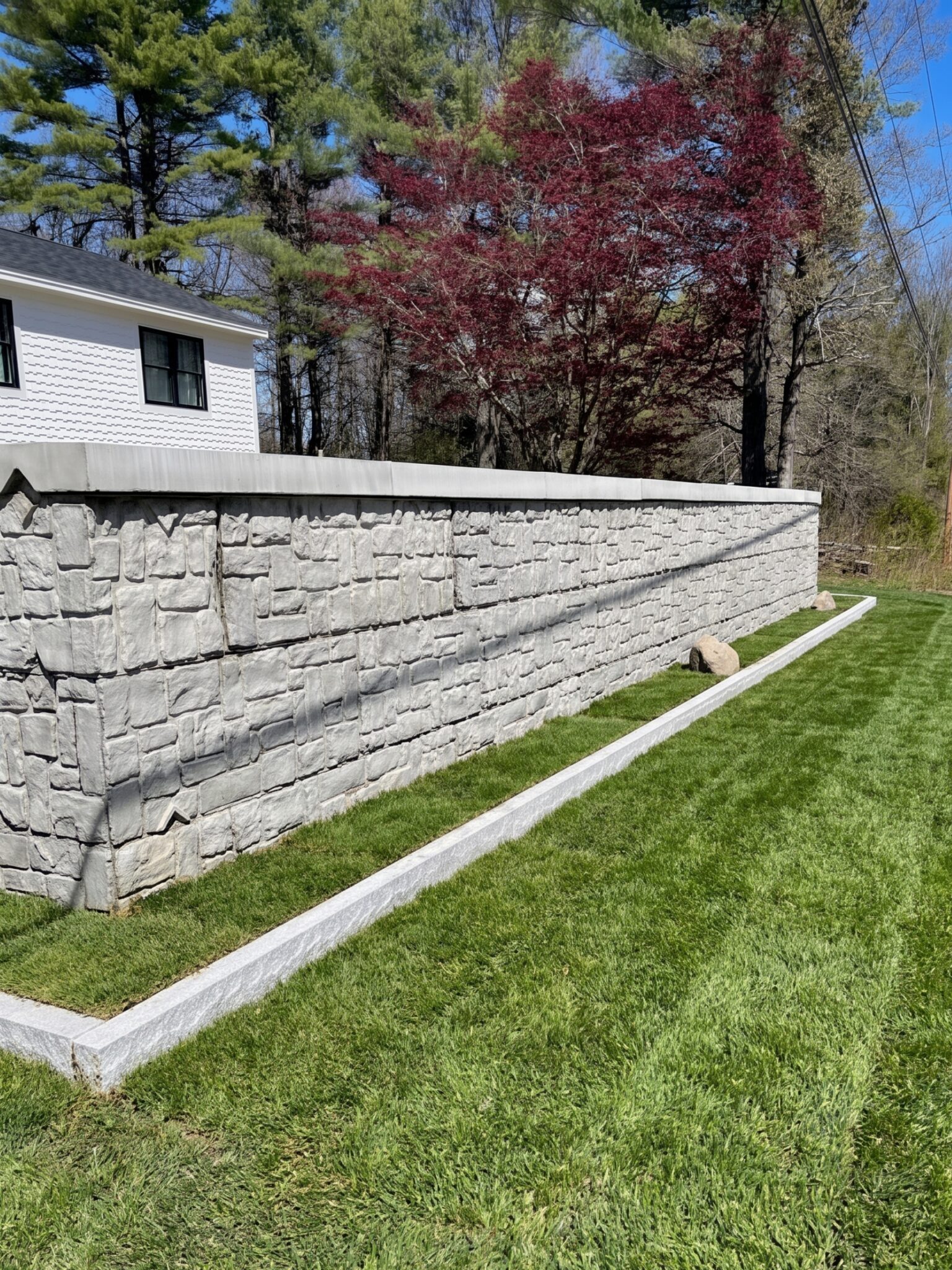 natural-fieldstone-foundation-veneer-dark-siding-maine