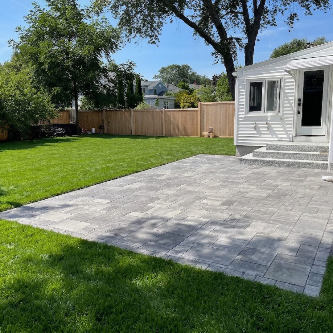 gray-paver-patio-granite-steps-backyard-lawn-installation