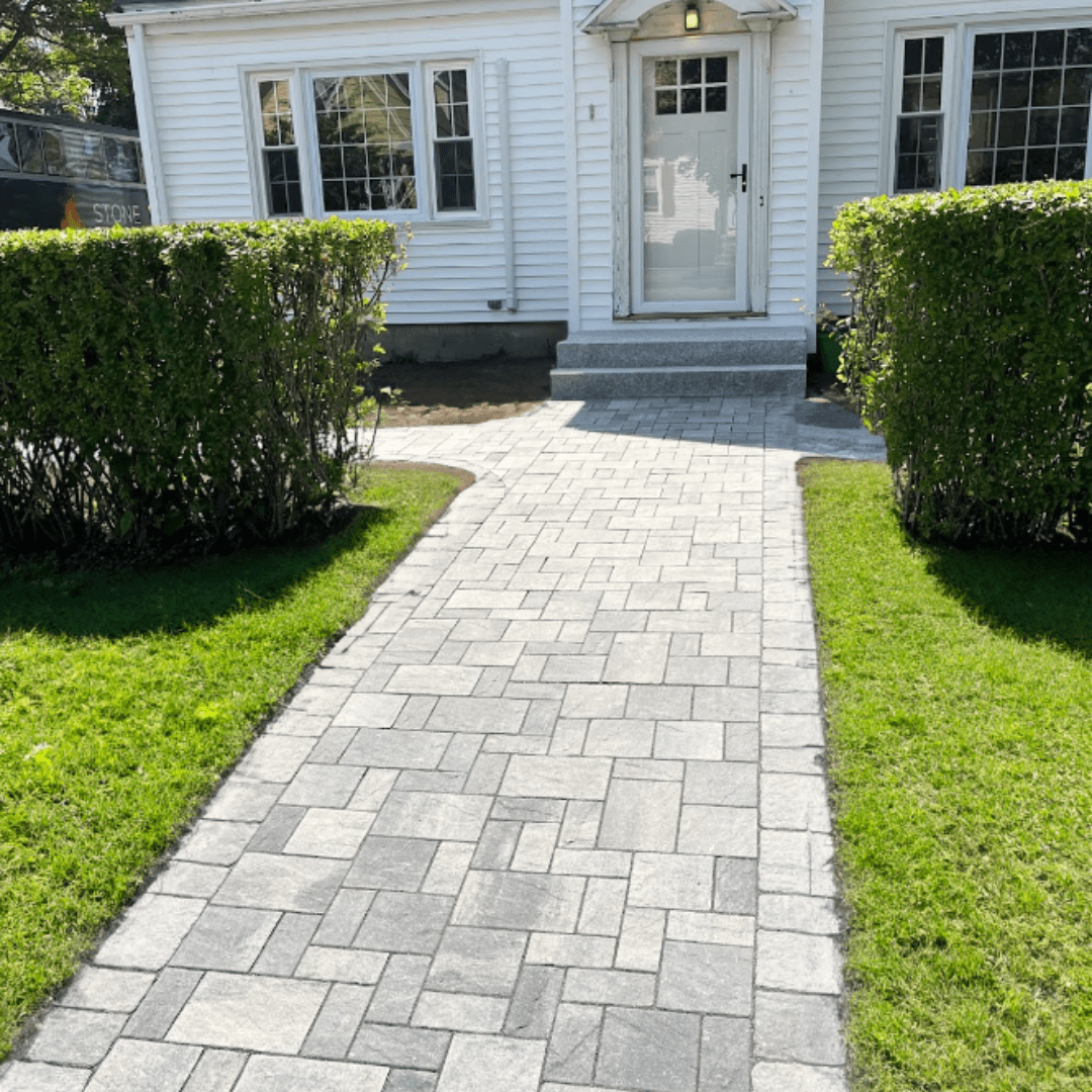 herringbone-paver-front-walkway-granite-steps-white-house