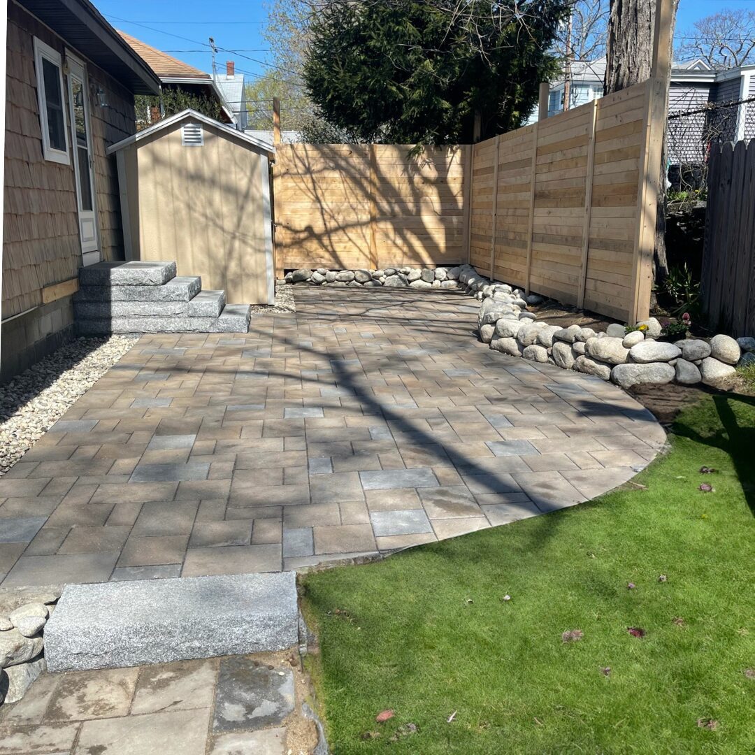 multi-size-paver-patio-walkway-granite-steps-river-rock-border-maine