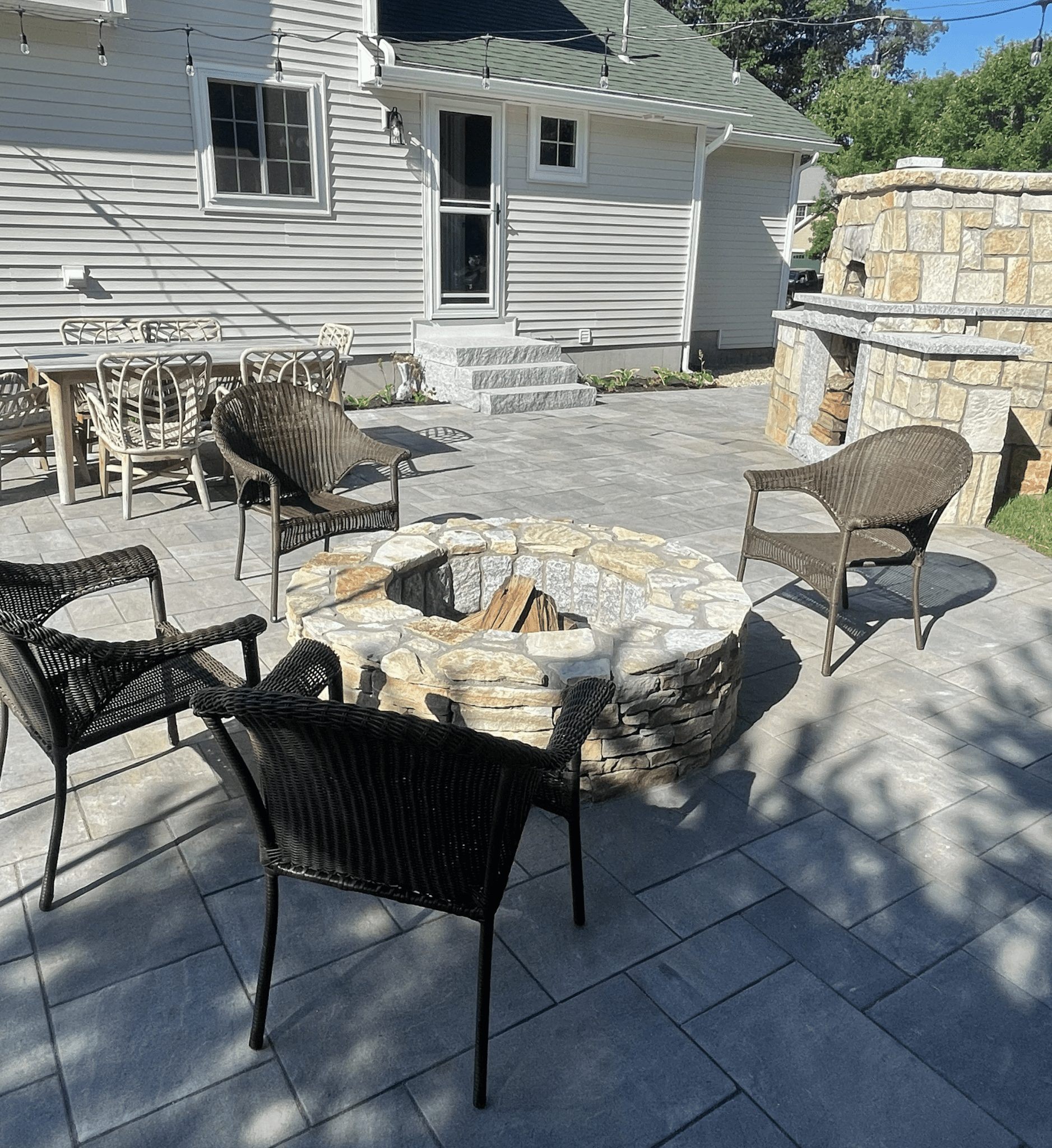 paver-patio-stone-fire-pit-outdoor-fireplace-dining-zone-southern-maine
