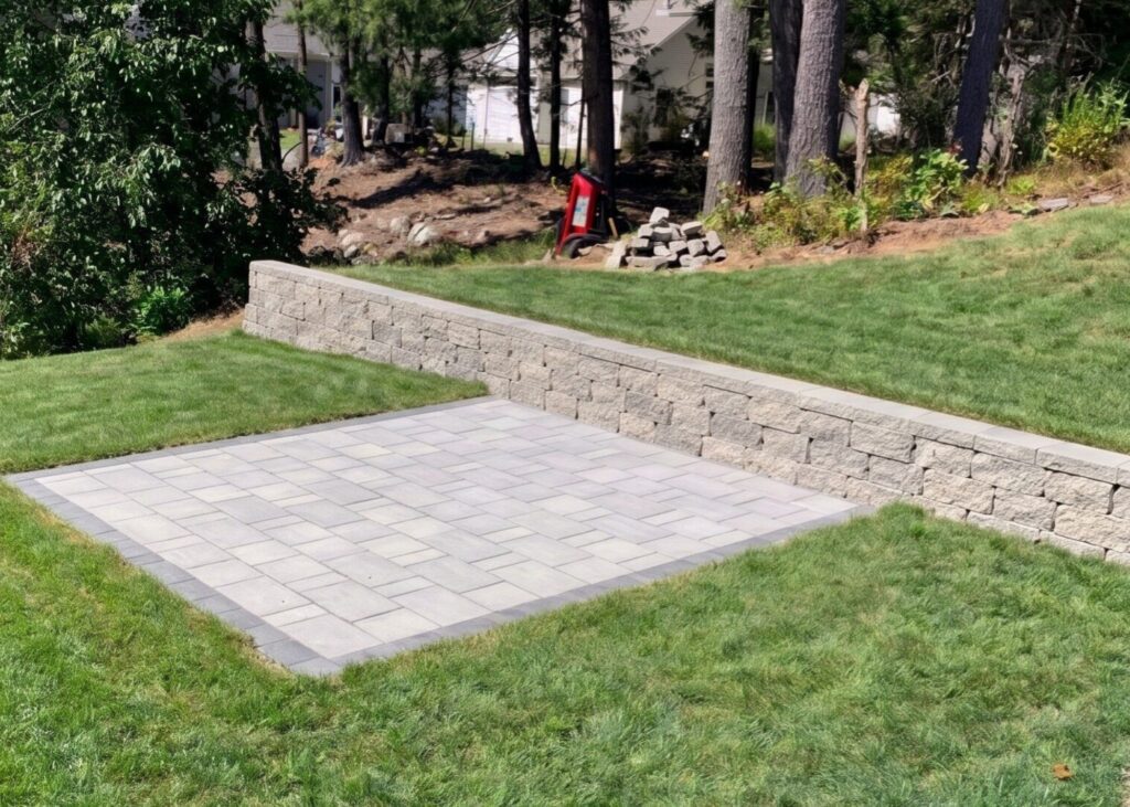 
granite-paver-patio-dry-stack-retaining-wall-maine-scaled