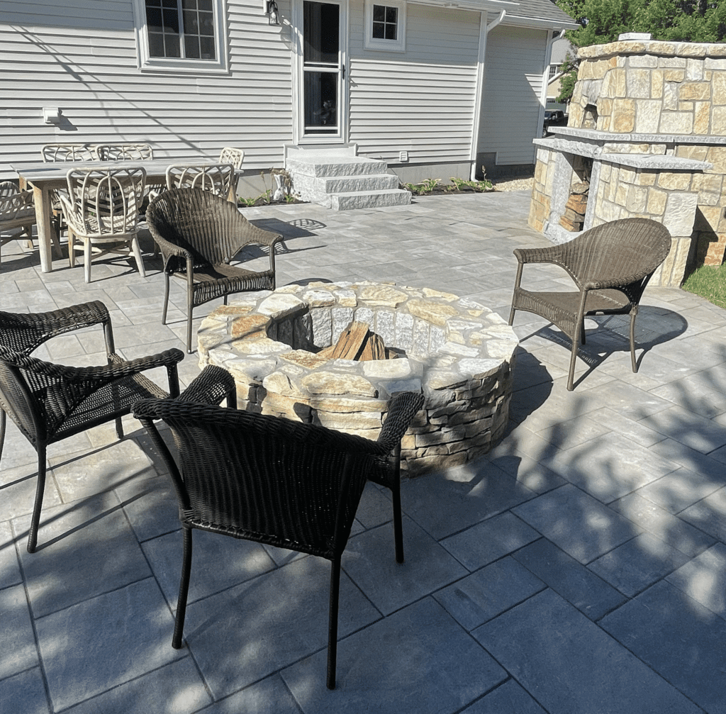 stone-fire-pit-seating-area-outdoor-fireplace-paver-patio-scaled